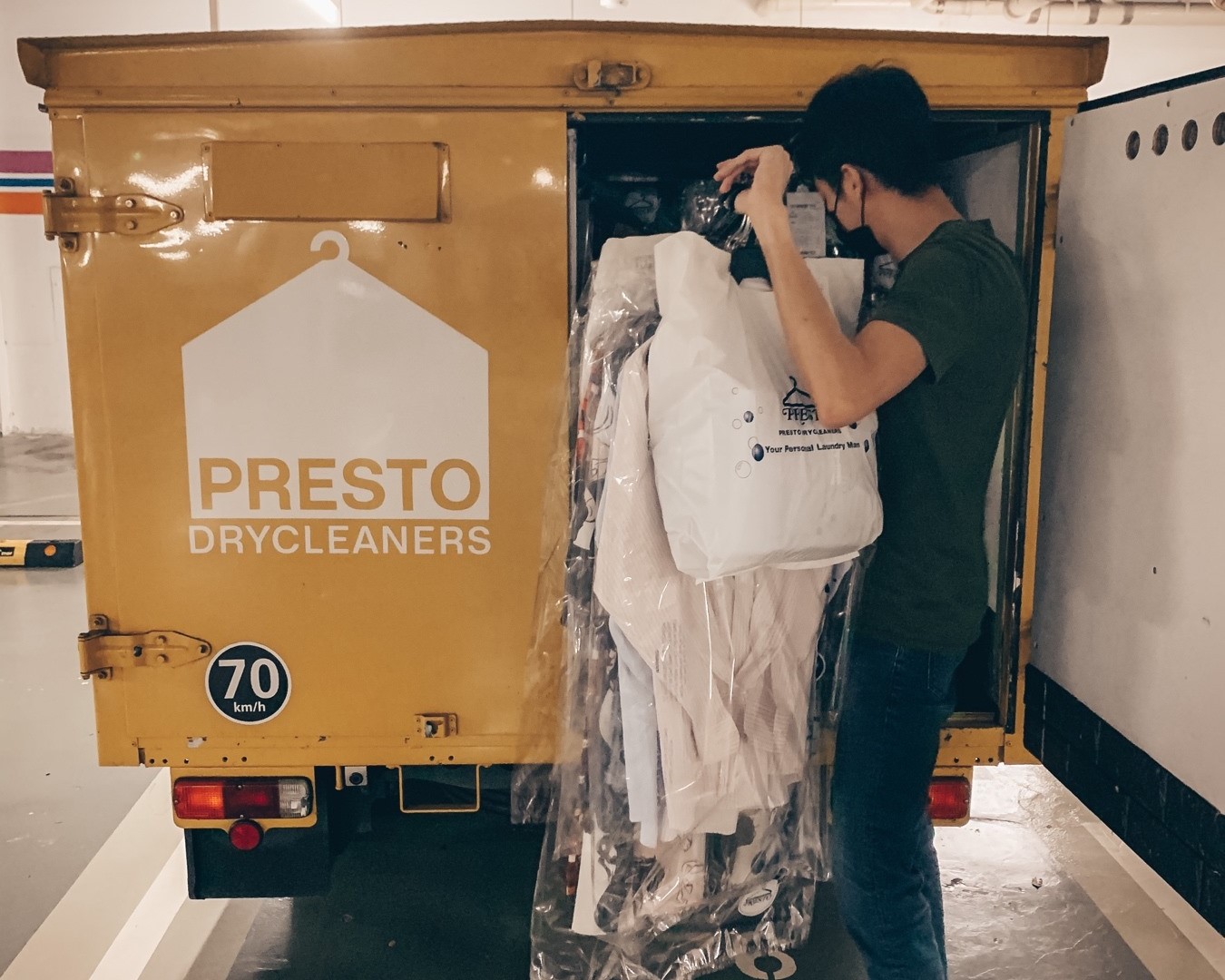 Presto Drycleaners delivery van loaded with garments for pickup