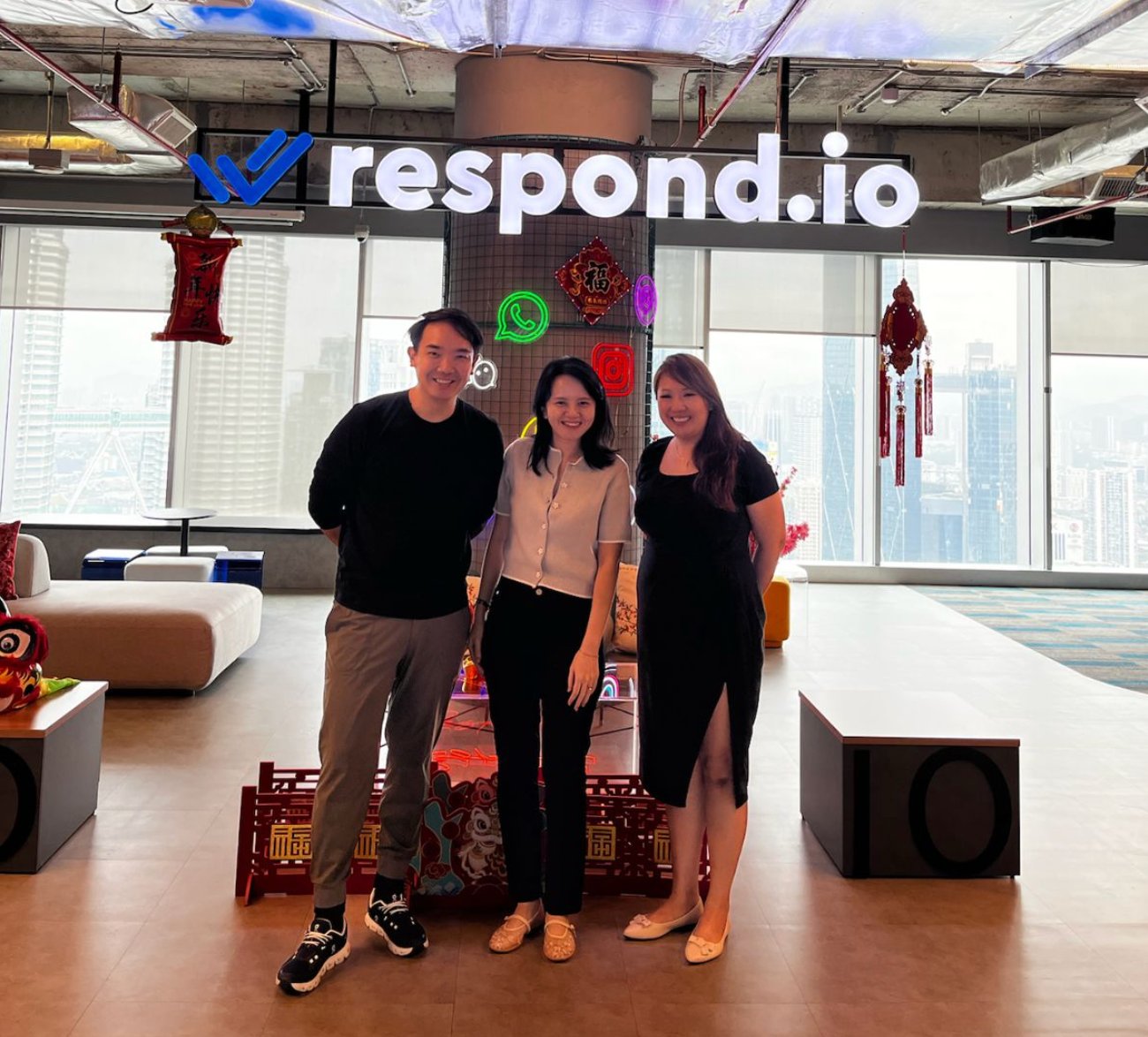 Zelix team Ryan Chua and Stephanie Lim with respond.io partner Rebecca Ooi at respond.io headquarters